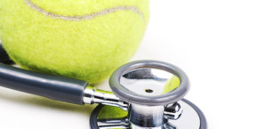 25226706 - stethoscope and tennis ball on isolate